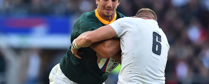 Springbok lock Eben Etzebeth (L) is tackled by England flanker Brad Shields (R) during the international rugby union test match between England and South Africa at Twickenham stadium in south-west London on 3 November 2018. Picture: AFP