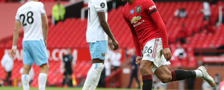 FILE: Manchester United striker Mason Greenwood celebrates after scoring the equalising goal during the English Premier League football match between Manchester United and West Ham United at Old Trafford in Manchester, north west England, on 22 July 2020. Picture: AFP