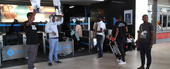 Lobby group #UniteBehind, along with frustrated train commuters, marched to Cape Town station demanding that Metrorail cleans up its act. Picture: EWN