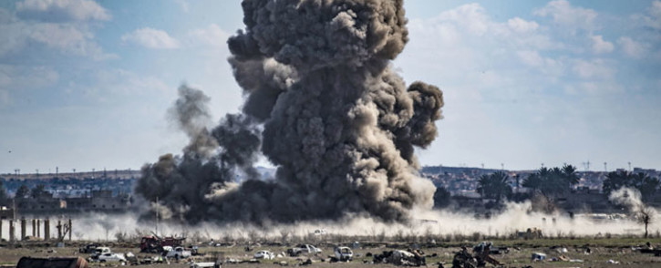 Smoke billows after shelling on the Islamic State group's last holdout of Baghouz, in the eastern Syrian Deir Ezzor province on 3 March 2019. Picture: AFP