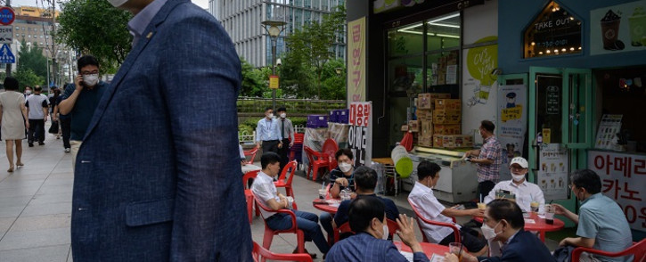 FILE: Diners at a street cafe in Seoul on 31 August 2020. Picture: AFP.