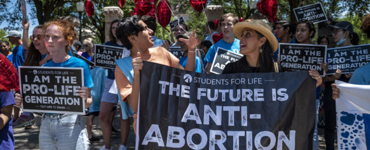 FILE: Pro-life protesters stand near the gate of the Texas state capitol at a protest outside the Texas state capitol on 29 May 2021 in Austin, Texas. Picture: Sergio Flores/AFP