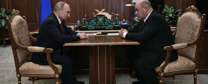 Russian President Vladimir Putin meets with Russia's tax service chief Mikhail Mishustin in Moscow on 15 January 2020. President Vladimir Putin on Wednesday formally proposed the head of Russia's tax service Mikhail Mishustin for the post of prime minister, news agencies reported. Picture: AFP