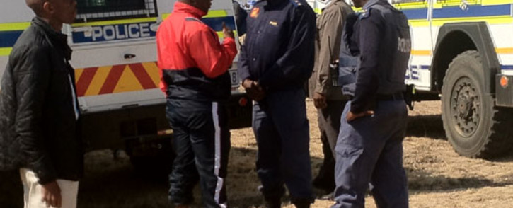 Expelled ANCYL leader Julius Malema with police on 18 August 2012. Picture: Taurai Maduna/EWN.