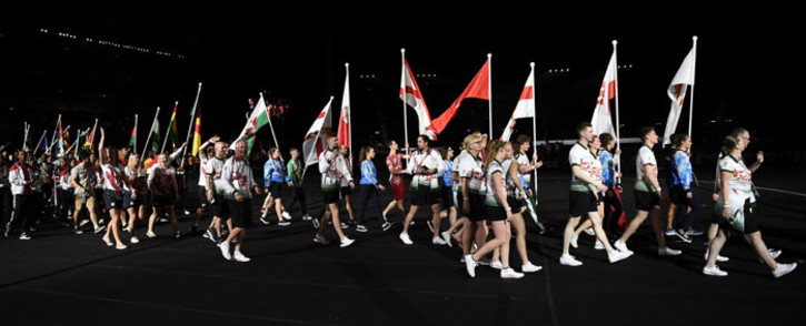 FILE: Athletes arrive for the closing ceremony of the 2018 Gold Coast Commonwealth Games at the Carrara Stadium on the Gold Coast on 15 April 2018. Picture: Ye Aung Thu/AFP