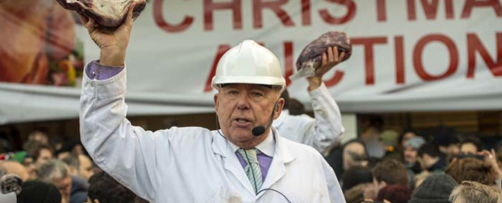 Butchers auction off cuts of meat during the traditional pre-Christmas meat auction at Smithfield market in the city of London on 24 December 2018. Picture: AFP
