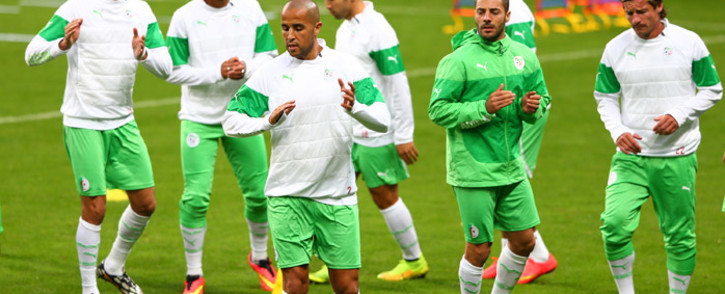 FILE: Algeria’s footballers jog during a training session on 29 June, 2014 at Arena do Gremio in Porto Alegre, on the eve of their Brazil 2014 Fifa World Cup Round of 16 football match against Germany. Picture: AFP.