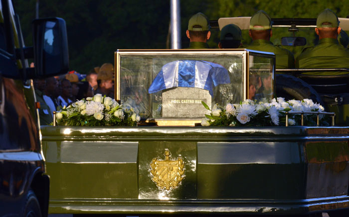 The urn with the ashes of Cuban leader Fidel Castro leave the Revolution Square in Havana starting a four-day journey across Cuba, November 30, 2016. Picture: AFP