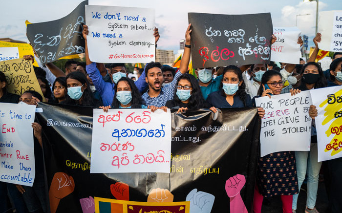 Protesters shout slogans during an ongoing anti-government demonstration near the president's office in Colombo on 18 April 2022, demanding President Gotabaya Rajapaksa’s resignation over the country's crippling economic crisis. Picture: Jewel SAMAD/AFP