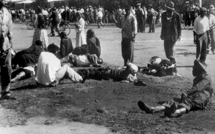 Wounded people lie in the street, 21 March 1960 in Sharpeville, near Vereeniging, where at least 180 black Africans, most of them women and children, were injured and 69 killed. Picture: AFP.