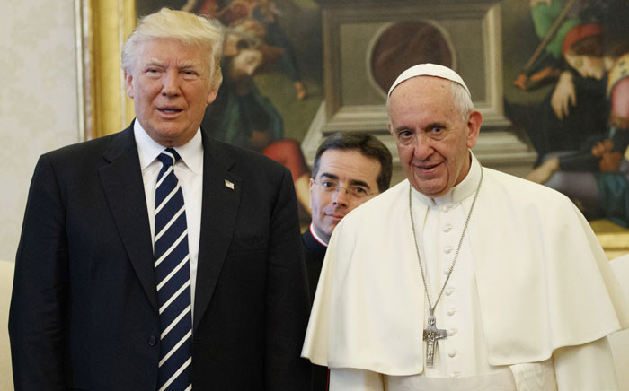 Pope Francis stands with US President Donald Trump during a private audience at the Vatican on 24 May 2017. Picture: AFP.