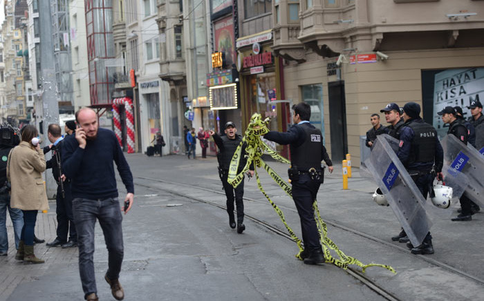 FILE: Turkish police push people away after an explosion on the pedestrian Istiklal Avenue in Istanbul on 19 March 2016. Picture: AFP. 