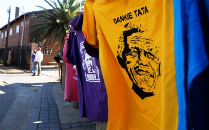 A T-shirt of Nelson Mandela on sale outside the Regina Mundi Roman Catholic church in Soweto, Wednesday, 26 June 2013. Picture: Werner Beukes/SAPA