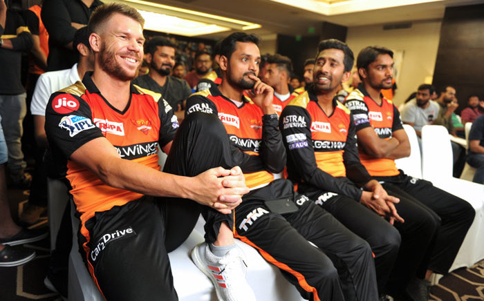 Sunrisers Hyderabad's David Warner (L) gestures while sitting with teammates during a press conference in Hyderabad on 20 March 2019, ahead of the start of the 2019 Indian Premier League (IPL) cricket tournament. Picture: AFP