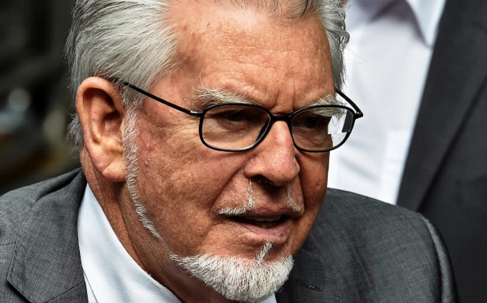 FILE: Veteran entertainer Rolf Harris arrives at Southwark Crown Court in central London on 4 July 2014. Picture: AFP.