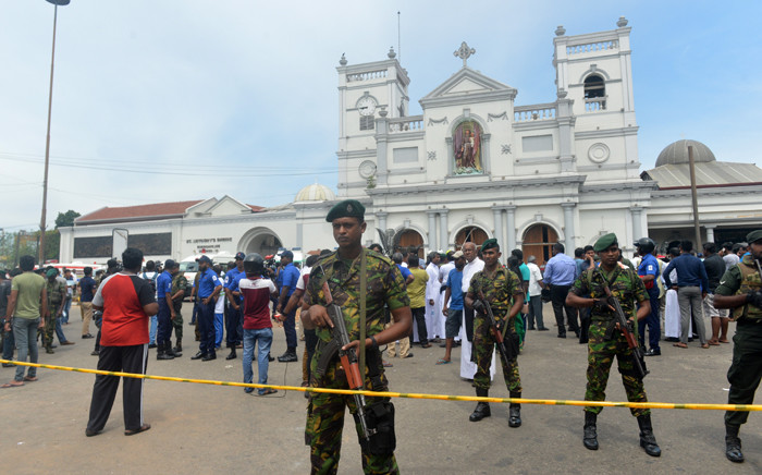 Sri Lankan security personnel keep watch outside the church premises following a blast at the St. Anthony's Shrine in Kochchikade, Colombo on 21 April 2019. Picture: AFP
