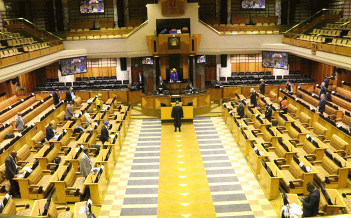Some members of Parliament in the House while others connect virtually on 23 June 2020. Picture: GCIS. 