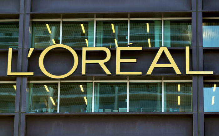 FILE: The logo of French group L'Oreal, the world's largest cosmetics maker, at its headquarters in Clichy, near Paris. Picture: AFP 