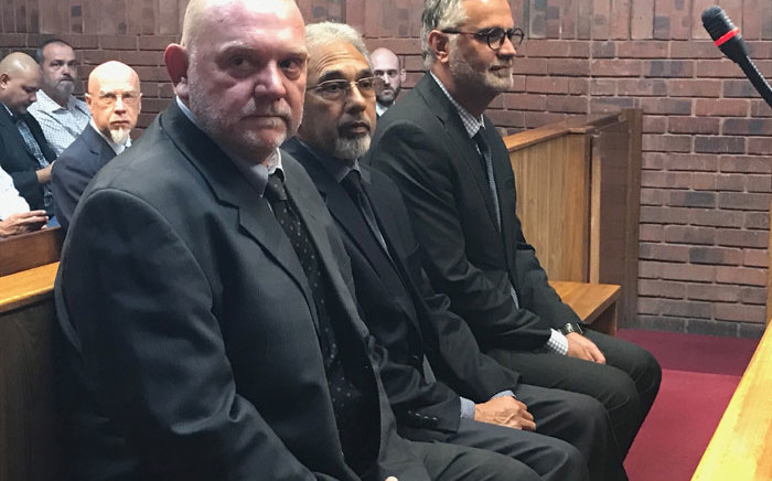 file: (From left) Andries Janse van Rensburg, Ivan Pillay and Johan van Loggerenberg in the Pretoria magistrates court on 9 April 2018. Picture: Barry Bateman/EWN