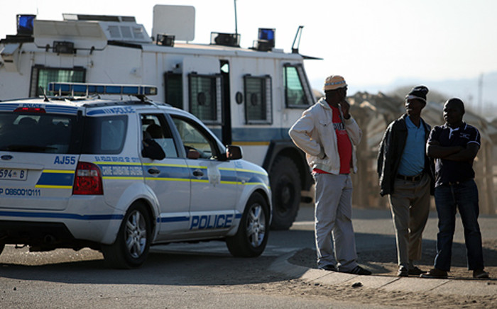 FILE: A heavy police presence was in place in the area surrounding the Lonmin Marikana mine after violent protests. Picture: EWN.
