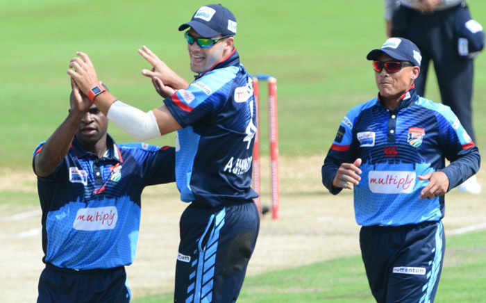 Titans players celebrate the fall of a wicket. Picture: @OfficialCSA/Twitter.