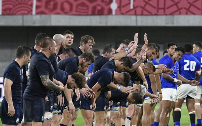 Scotland's players bow to the crowd after winning the Japan 2019 Rugby World Cup Pool A match between Scotland and Samoa at the Kobe Misaki Stadium in Kobe on 30 September 2019. Picture: AFP