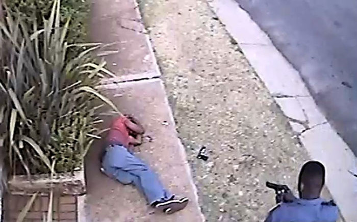 A screengrab from a video showing a police officer shooting Khulekani Mpanza in Krugersdorp.