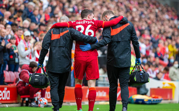 Liverpool defender Andy Robertson is helped off the field after picking up an injury during the friendly match against Athletic Bilbao on 8 August 2021. Picture: @LFC/Twitter