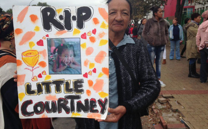 FILE: A resident pictured outside court to support the family of three-year-old Courtney Pieters following her murder. Picture: Lauren Isaacs/EWN