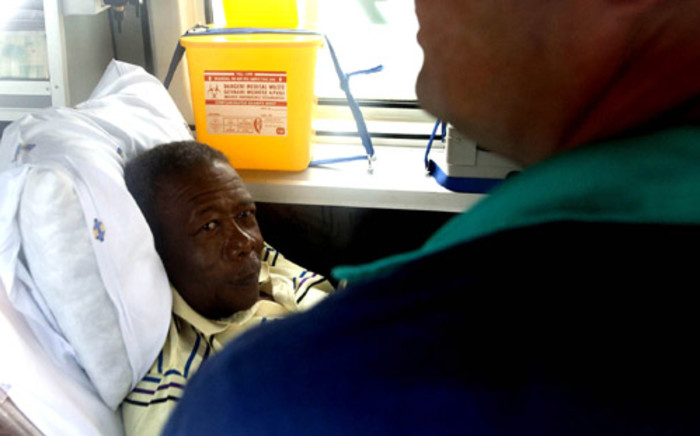 Former national police commissioner Jackie Selebi is seen in the back of an ambulance in 2011. Picture: Sapa