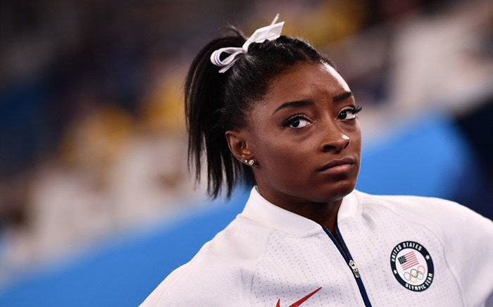 USA's Simone Biles reacts during the artistic gymnastics women's team final during the Tokyo 2020 Olympic Games at the Ariake Gymnastics Centre in Tokyo on 27 July 2021. Picture: Loic Venance/AFP