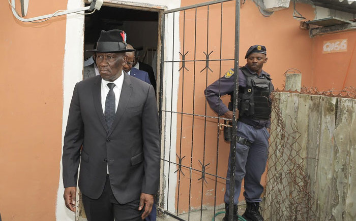 Police Minister Bheki Cele visits the Khayelitsha tavern where seven people were killed by gunmen. Picture: @SAPoliceService/Twitter