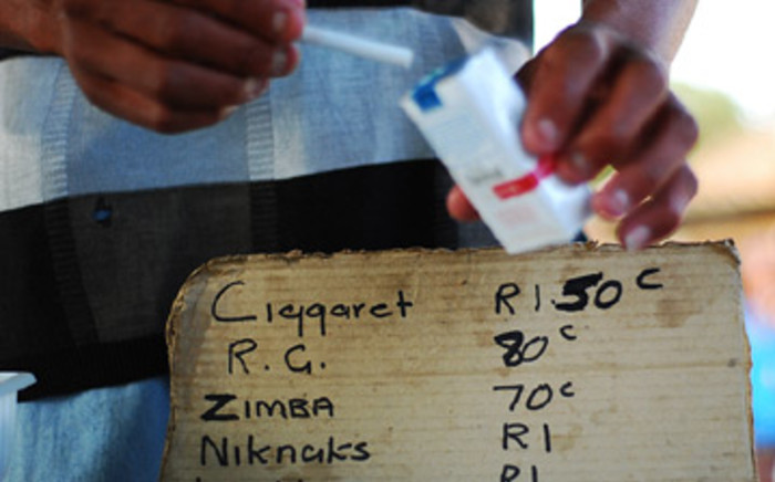 FILE: A vendor sells cigarettes on the side of the road in Alexandra township. Picture: EWN.
