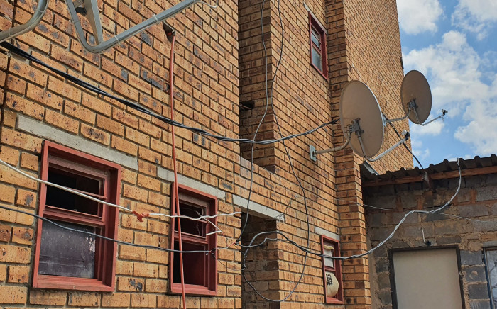 The dangerous illegally-connected cables hanging from the flats in Riverpark Alexandra. Picture: Twitter/@CityPower