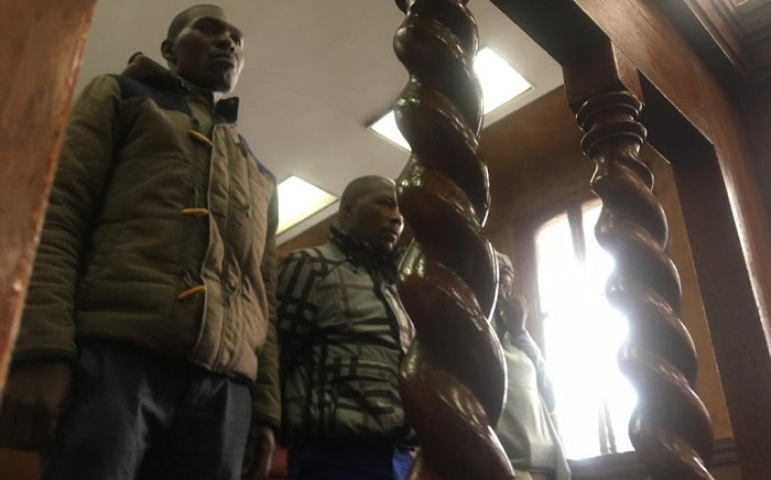 Three of several policemen arrested for corruption and defeating the ends of justice after the JHB CBD raids in court on Monday, 12 August 2019. Picture: Edwin Ntshidi/EWN