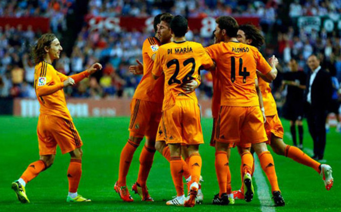 Real Madrid players celebrate with Sergio Ramos after his goal against Real Valladolid on 7 May 2014. Picture: Facebook.