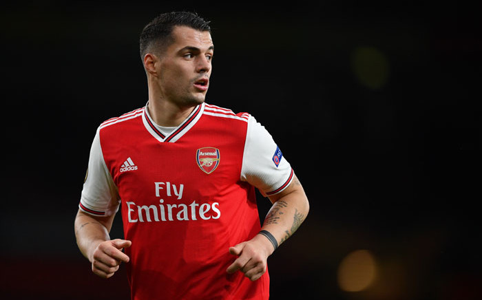 FILE: Arsenal midfielder Granit Xhaka runs during their UEFA Europa League Group F football match between Arsenal and Eintracht Frankfurt at the Emirates stadium in London on 28 November 2019. Picture: AFP
