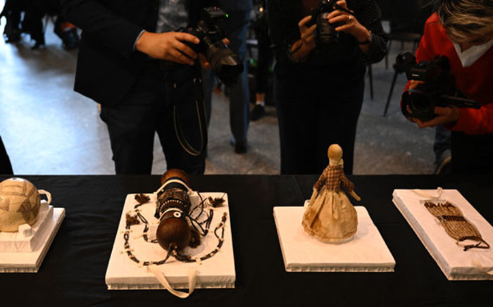 Namibian art pieces from the collection of the Ethnological Museum in Berlin are on display during a press conference on 24 May 2022, before 23 parts of the collection will travel to the National Museum of Namibia in the framework of the partnership research project titled "Confronting Colonial Pasts, Envisioning Creative Futures". Picture: Tobias SCHWARZ/AFP