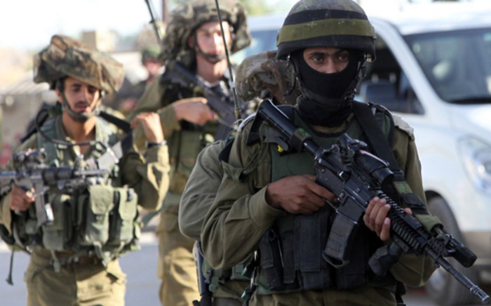 The army says more than 150 Palestinians have been arrested in the search for the three youngsters who were snatched from the Gush Etzion settlement bloc in the southern West Bank on June 12, with Israel pointing the finger at Hamas. Picture: AFP. 