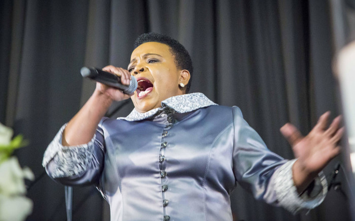 Gospel singer Rebecca Malope dedicates a song to Lundi Tyamara at his memorial at the Grace Bible Church in Soweto. Picture: Thomas Holder