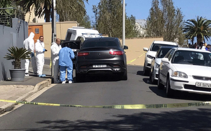 FILE: Police and forensic experts comb the scene of a shooting after prominent advocate Pete Mihalik was gunned down outside a Cape Town school on 30 October 2018. Picture: Kaylynn Palm/Eyewitness News