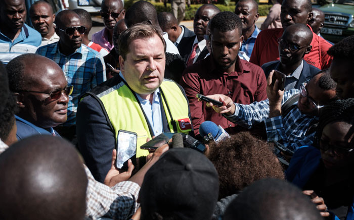 Kenya Airways's CEO Sebastian Mikosz (2nd L) speaks to media during a strike by the airline workers at the Jomo Kenyatta International Airport in Nairobi, Kenya, on 6 March 2019. Picture: AFP
