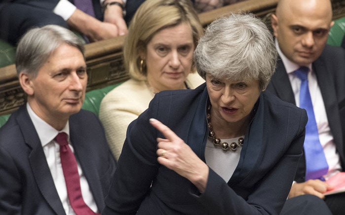 A handout photograph taken and released by the UK Parliament on 3 April 2019 shows Britain's Prime Minister Theresa May speaking during the weekly Prime Minister's Questions (PMQs) question and answer session in the House of Commons in London. Picture: AFP
