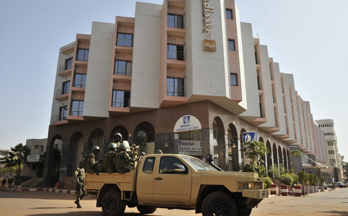 Malian troops patrolling outside the Radisson Blu hotel in Bamako a day after the deadly jihadist siege at the luxury hotel. Picture: AFP