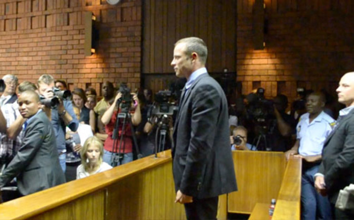 FILE: Oscar Pistorius stands in the dock as he waits to hear the outcome of his bail application. Picture: Lesego Ngobeni/EWN.