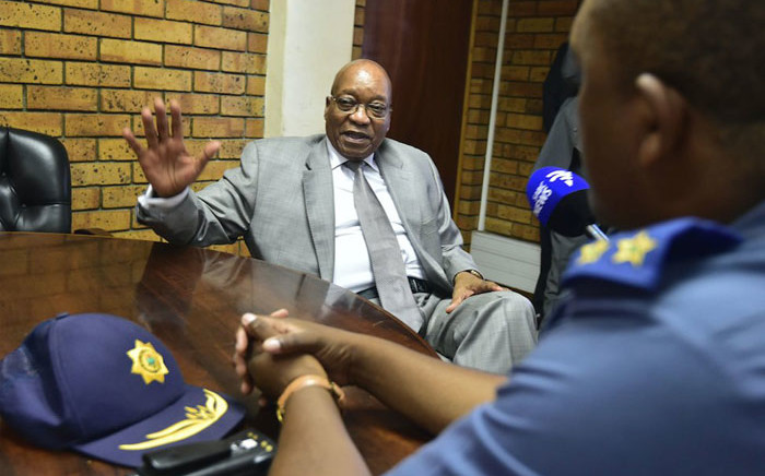 President Jacob Zuma chats to police officers at the Nyanga Police Station in cape Town. Picture: @PresidencyZA/Twitter