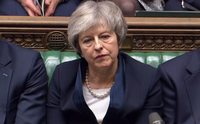 A video grab from footage broadcast by the UK Parliament's Parliamentary Recording Unit (PRU) shows Britain's Prime Minister Theresa May reacting as Labour Party leader Jeremy Corbyn informs the MPs that he has tabled a vote of no confidence in the Government in the House of Commons in London on 15 January 2019, after MPs voted to reject the government's Brexit deal. Picture: AFP