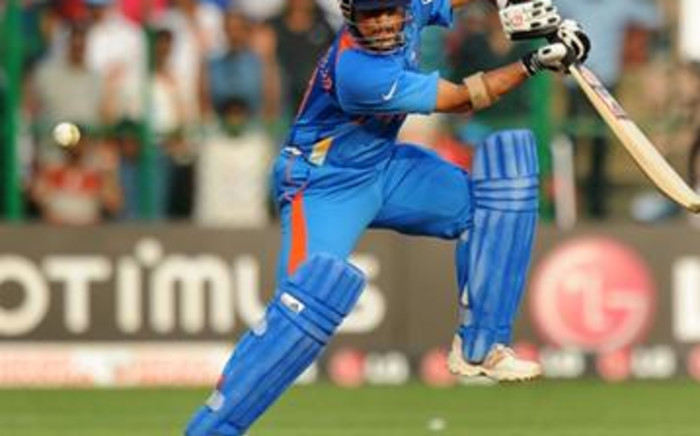Indian cricketer Sachin Tendulkar plays a shot during the ICC Cricket World Cup 2011 match between England and India in Bangalore on 27/02/2011. Picture: AFP.