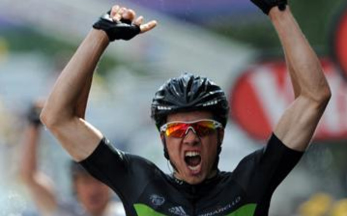 Norway's Edvald Boasson Hagen celebrates on the finish line as he wins the 2011 Tour de France. Picture: AFP