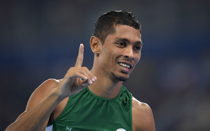 South Africa's Wayde van Niekerk celebrates winning the Men's 400m Final at the Rio 2016 Olympic Games at the Olympic Stadium in Rio de Janeiro on August 14, 2016. Picture: AFP